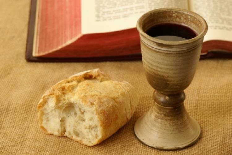 Image showing bread and a cup of wine to depict the Last Supper
