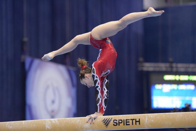 Italian athlete Carlotta Ferlito, performs on the balance beam in the 5th European Championships in Artistic Gymnastics in Moscow, Russia on April 21, 2013.