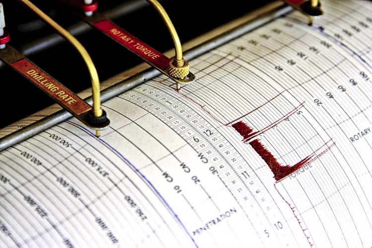 Seismograph for measuring tremors.