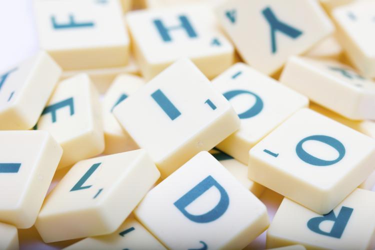 Scrabble letter blocks.