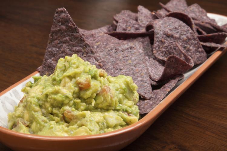 Tortilla chips and guacamole.