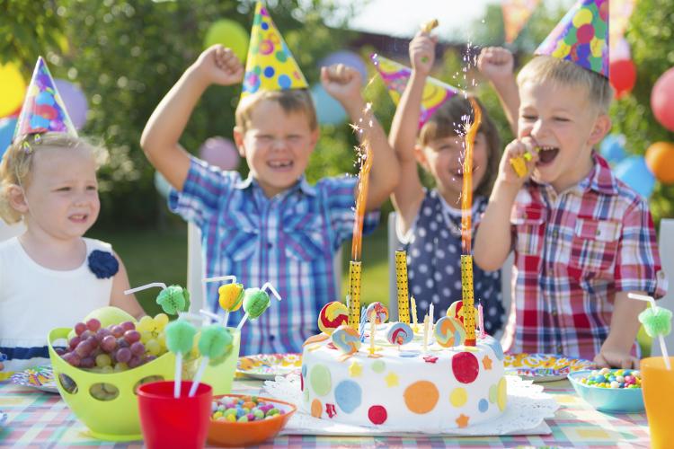 Group of kids having fun at a birthday party.