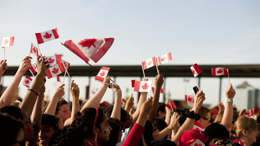 waving canadian flags