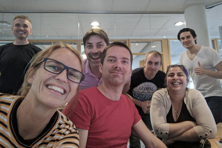 Image of the timeanddate staff in new office.