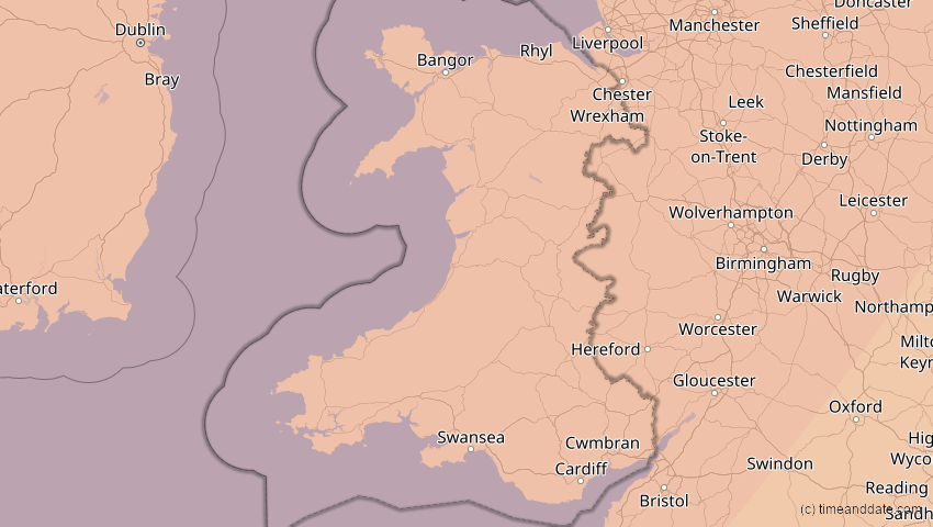 A map of Wales, Großbritannien, showing the path of the 5. Feb 2065 Partielle Sonnenfinsternis